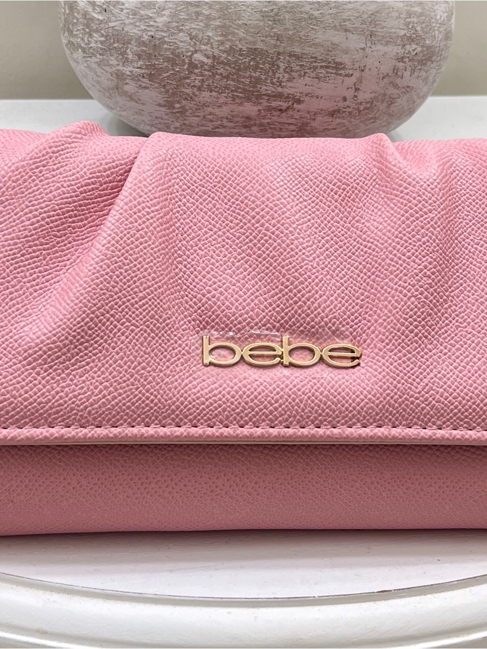 bebe Pink Textured Foldover Clutch with Gold Logo